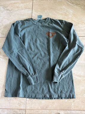 Comfort Colors Long Sleeve Crewneck Shirt in Forest Green with Orange Logo